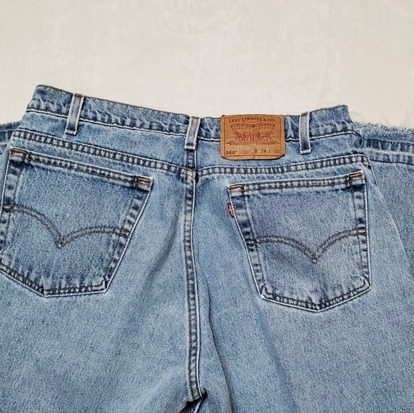 VINTAGE Levi's 560 Grunge Mid Wash Stone Wash Loose Raw Cut Distressed Jeans - Picture 8 of 12